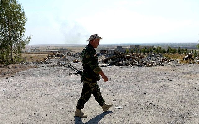 In Iraq, 20 people killed in two suicide attacks