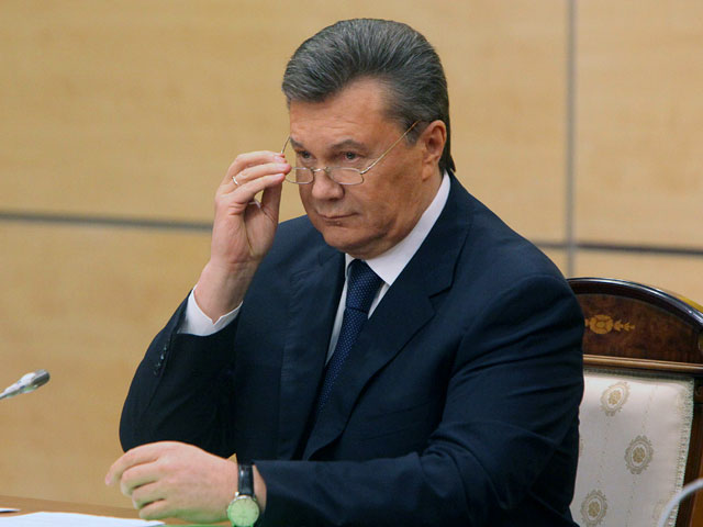 Poroshenko signed a law allowing in absentia condemn Yanukovych and those "who robbed the people"